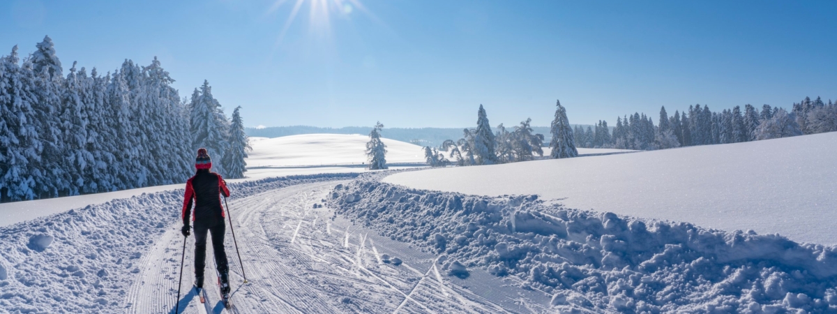 Beatiful,Active,Senior,Woman,Cross-country,Skiing,In,Fresh,Fallen,Powder