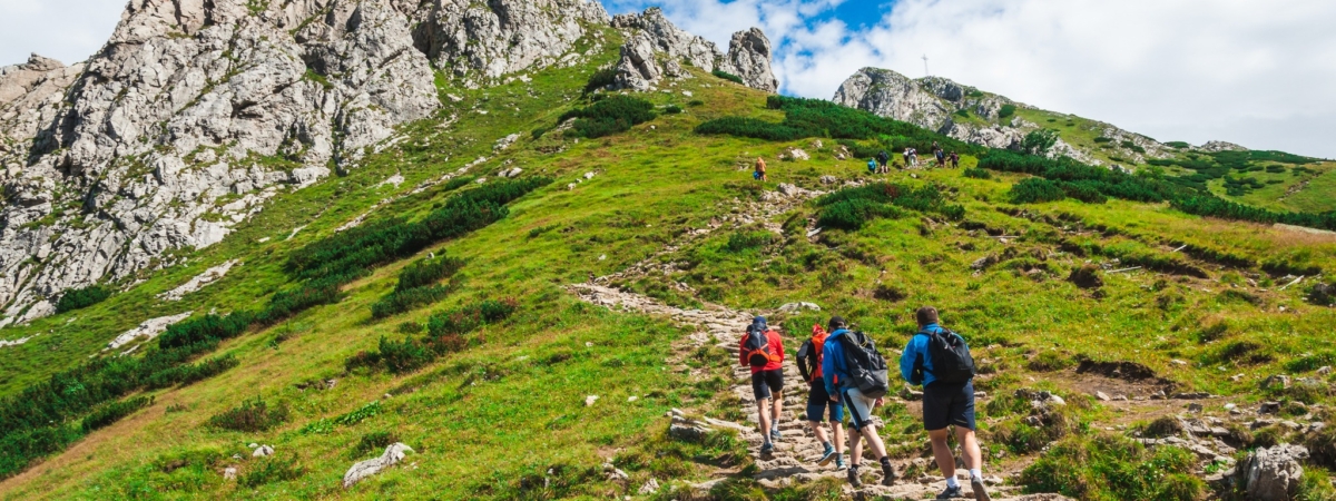 A view of the peaks Small Giewont and Giewont. Majestic mountain landscape in Tatras. Zakopane, Poland. Trekkers discover the world. Active lifestyle, sport and tourism.