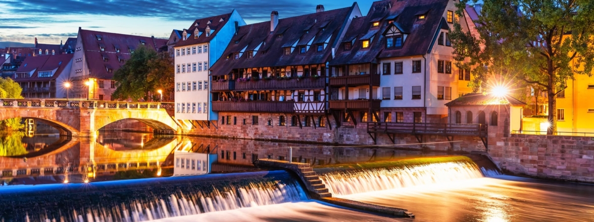 Scenic summer night view of the bridge over Pegnitz River in the Old Town of Nurnberg, Bavaria, Germany